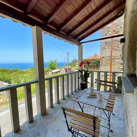 Tiny House With Sunset Over The Ocean Oia