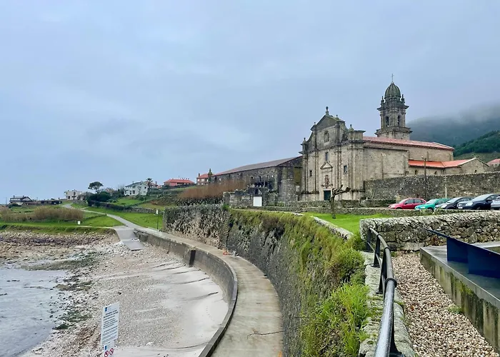 Tiny House With Sunset Over The Ocean Oia