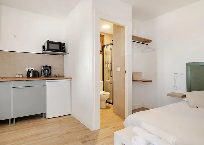 Tiny House With Sunset Over The Ocean Oia